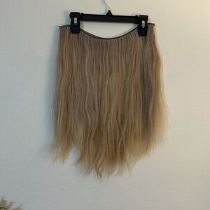 JZ styles hand tied extensions.